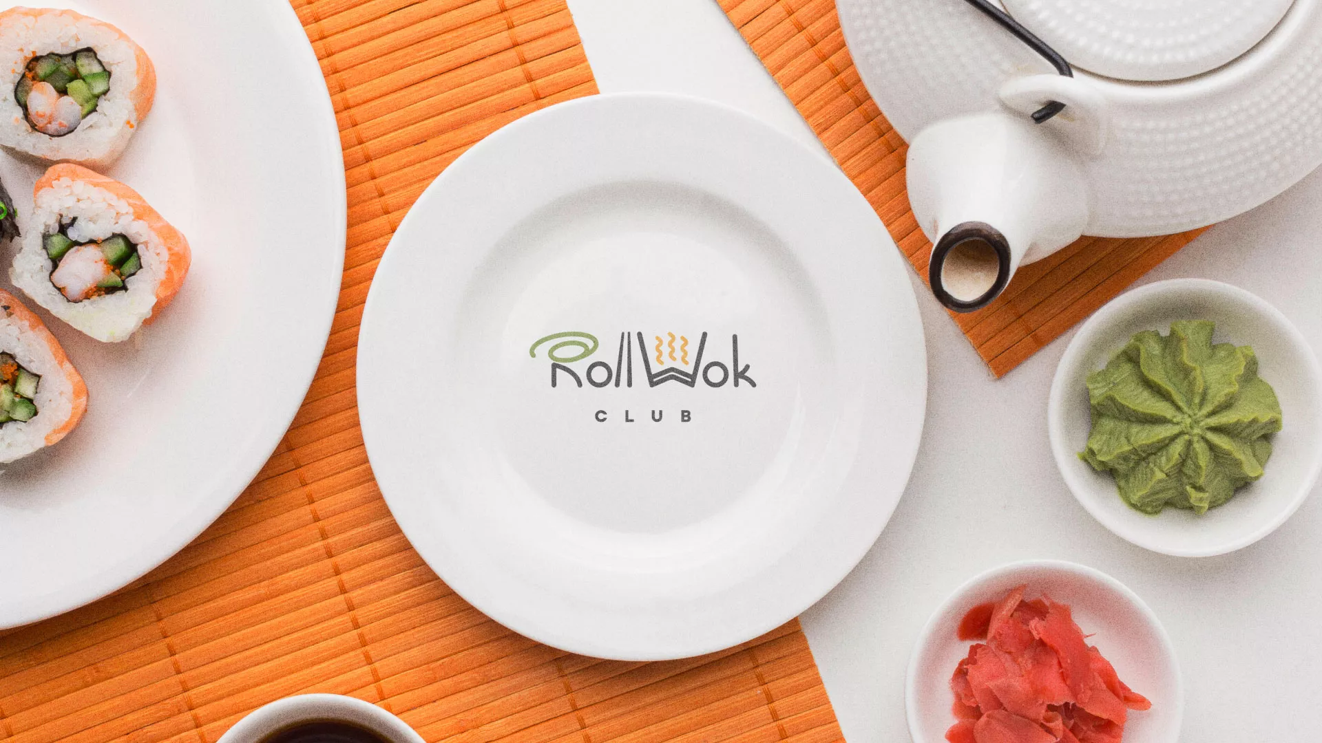 Разработка логотипа и фирменного стиля в Новоуральске для суши-бара «Roll Wok Club» Разработка логотипа и фирменного стиля в Новоуральске для суши-бара «Roll Wok Club»